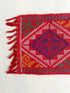 Yakan Handwoven Cloth - Red Coaster. A traditional Yakan handwoven square in Red with vibrant blue, yellow, and green geometric patterns. A stunning piece of Philippine heritage, perfect for display or functional décor.