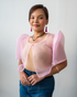 A baby pink sheer Filipiniana bolero crafted from delicate organza, showcasing modern design with subtle traditional details.