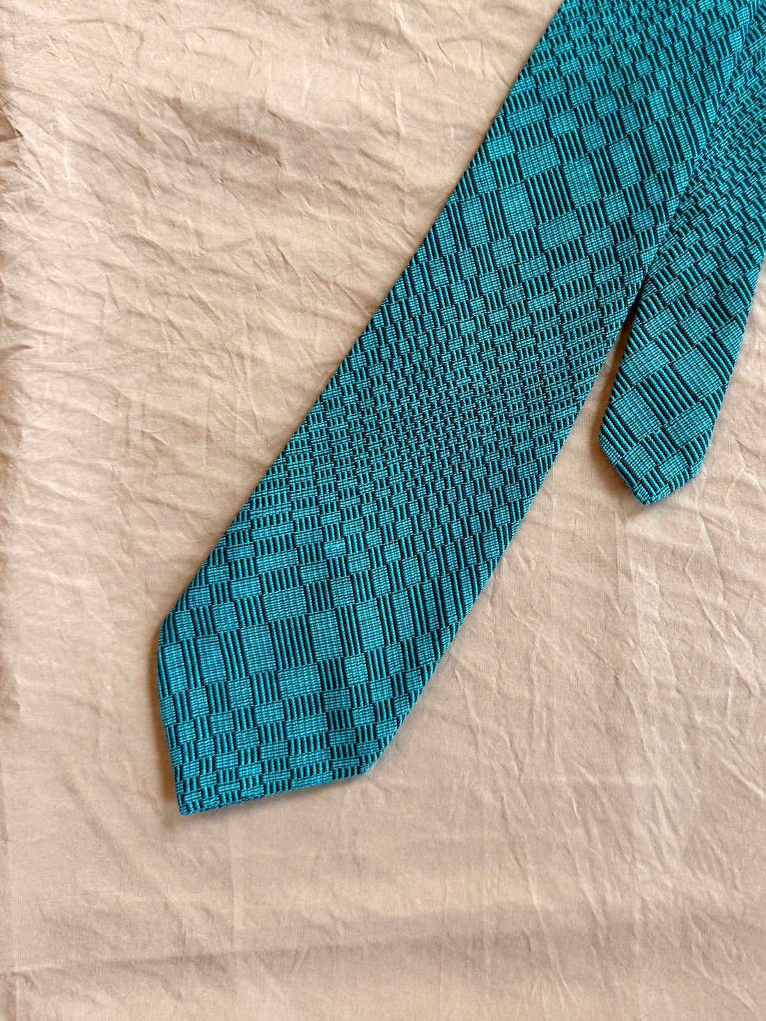 Handwoven Kusikus Necktie in Celadon Green – Made from durable polycotton, this necktie features intricate geometric patterns inspired by traditional Isabela weaving.