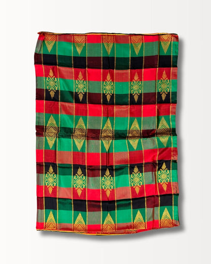 Handwoven Malong with red, green, and black stripes, featuring gold geometric patterns.