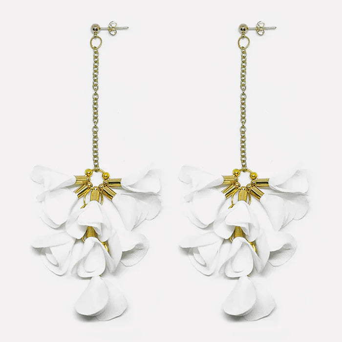 White handcrafted Bloom Drop earrings with layered fabric petals, made in the Philippines—an elegant expression of Filipino artistry and design.